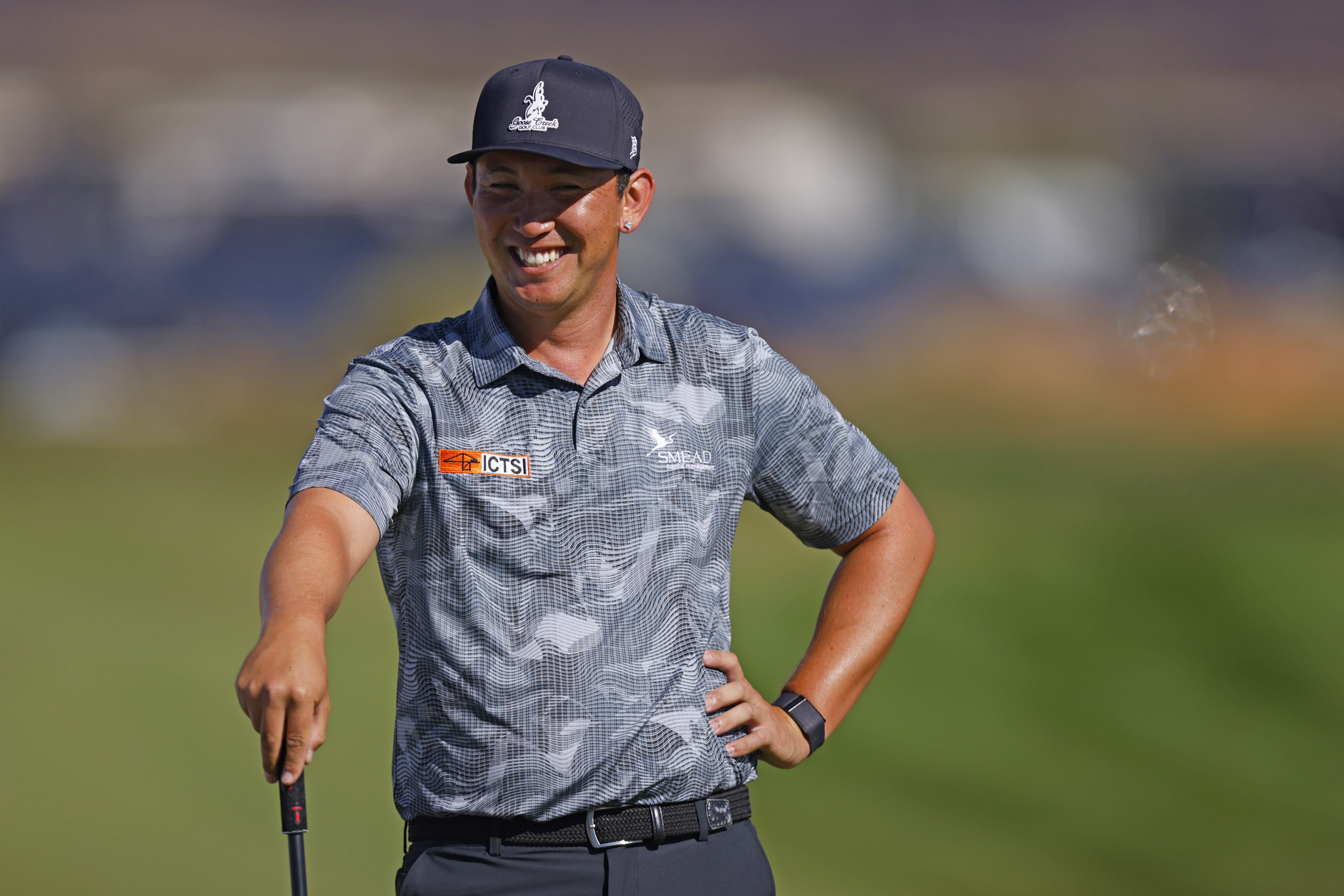 Rico Hoey smiles with his hand on his hip at the 2025 Bank of Utah Championship