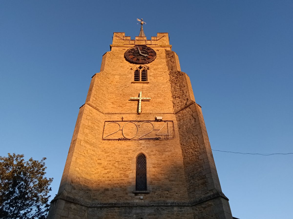 Church spire against a blue sky taken on a OnePlus Pad Go