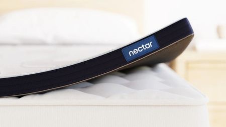 The Nectar Mattress Topper on a quilted pillow-top mattress.