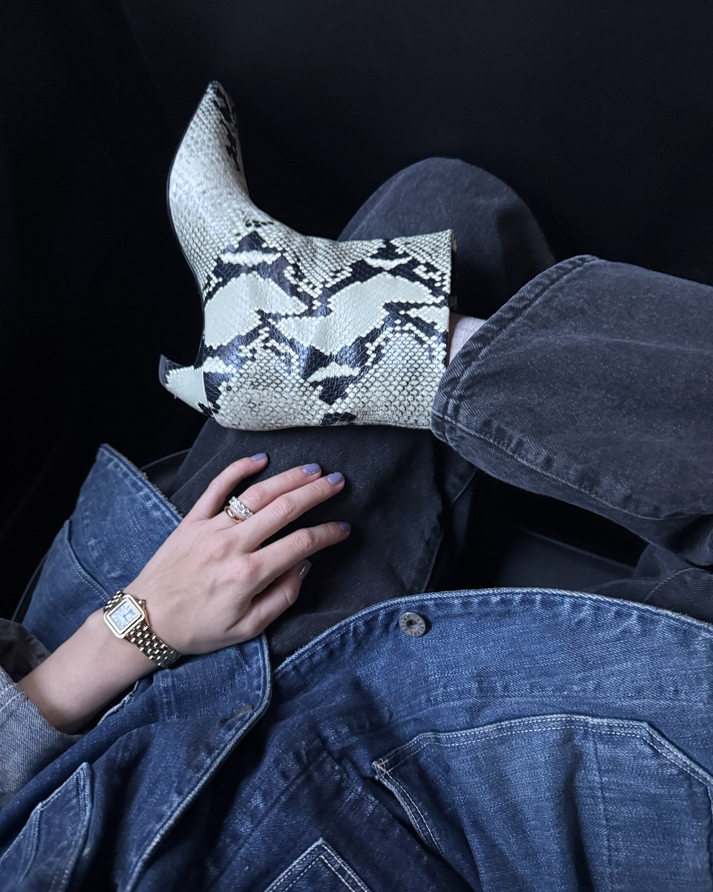 snake-skin boots with grey jeans and denim jacket.