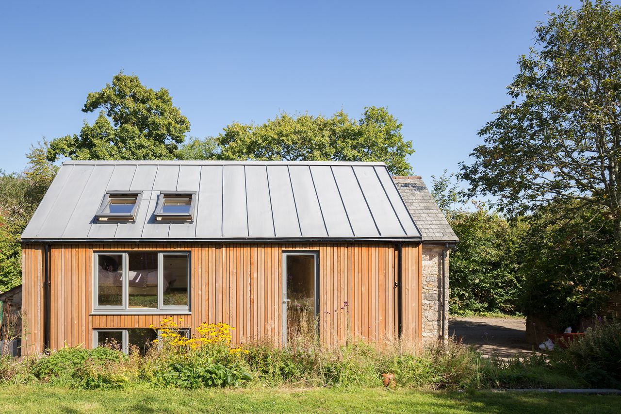 side view of double storey extension with zinc roof