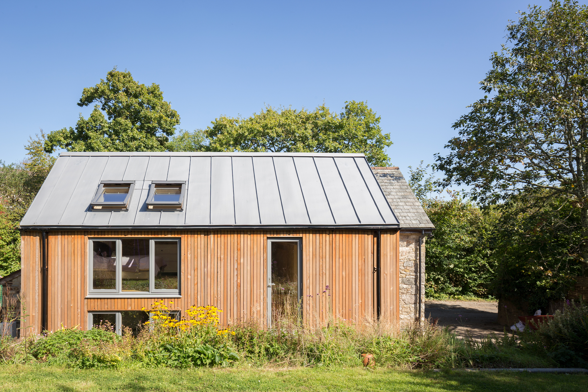 side view of double storey extension with zinc roof