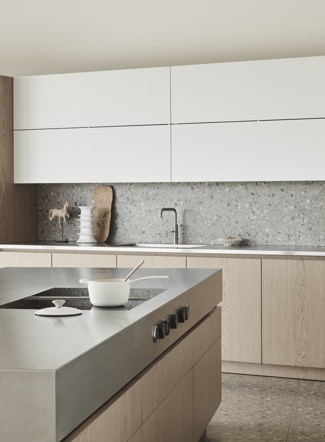 A kitchen with large sockets on the island