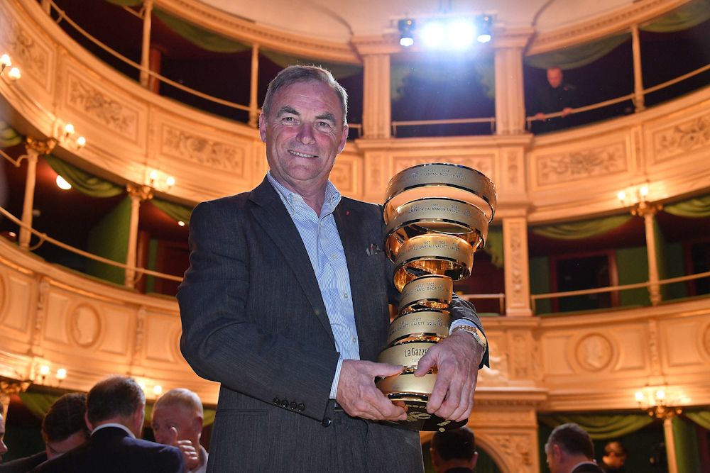 Bernard Hinault poses with the Giro d'Italia trophy