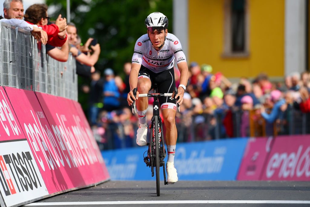 LAVARONE ITALY MAY 25 Joo Almeida of Portugal and UAE Team Emirates white best young jersey crosses the finishing line during the 105th Giro dItalia 2022 Stage 17 a 168 km stage from Ponte di Legno to Lavarone 1161m Giro WorldTour on May 25 2022 in Lavarone Italy Photo by Tim de WaeleGetty Images