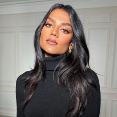 Simone Ashley with long, glossy hair