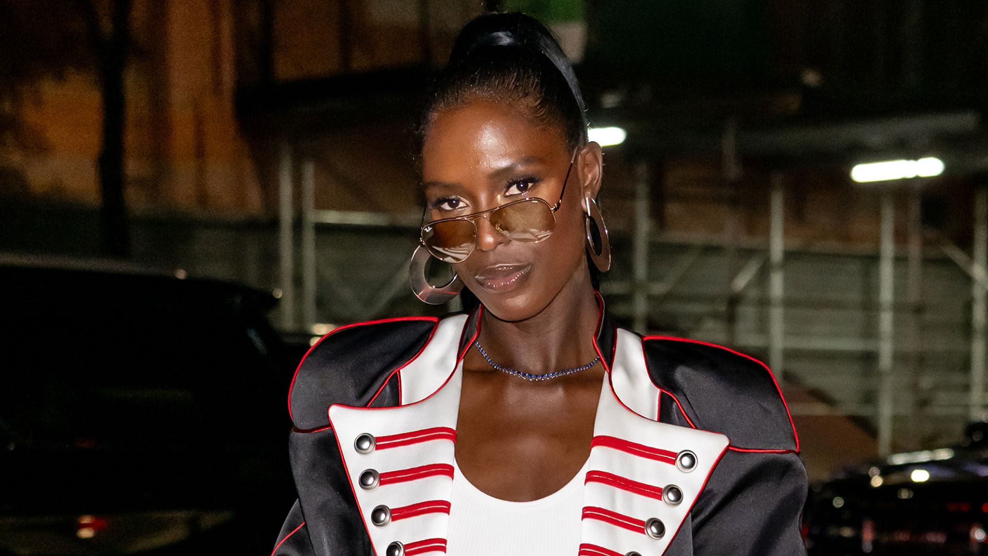 Jodie Turner‑Smith wearing a chic headband with wavy hair