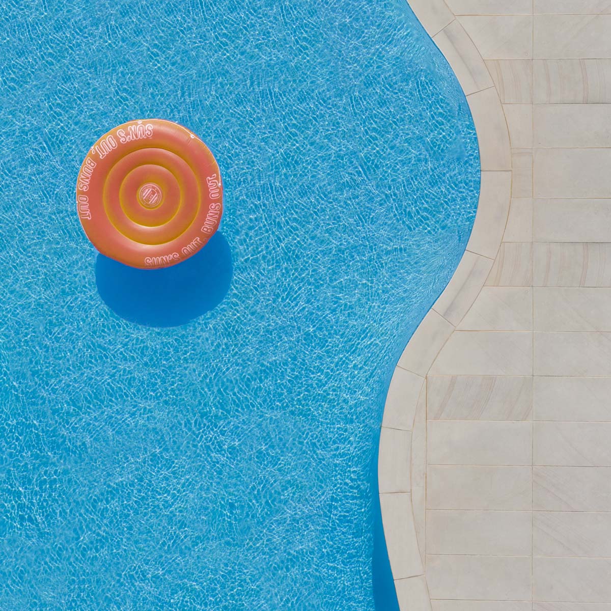 Aerial view of a blue swimming pool