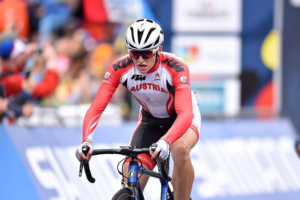 Felix Gall (Austria) crosses the line with the junior men's victory at Worlds