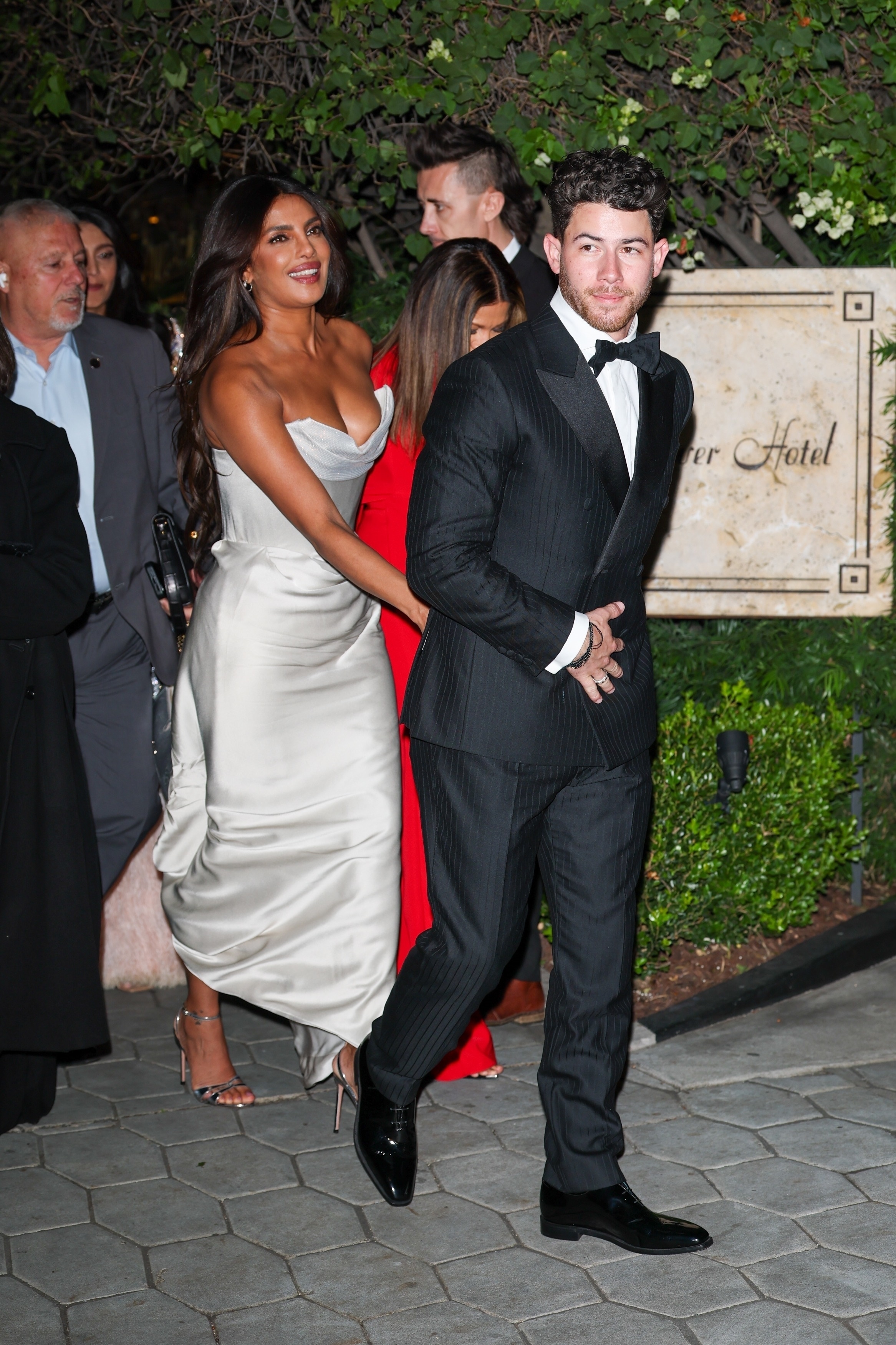 Priyanka Chopra Jonas wears a white dress at the Golden Globes after-party