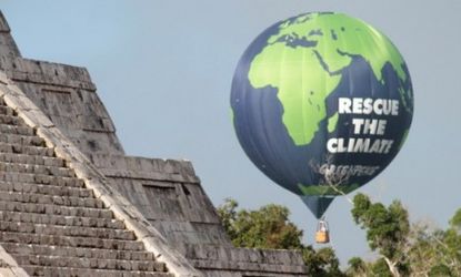 A balloon of the environmental group Greenpeace next to the Mayan ruins during the Rio+20 in Mexico: Climate-change deniers have poured millions of dollars into discrediting the work of clima