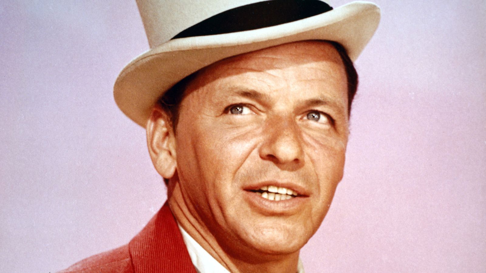 frank sinatra on a pink background
