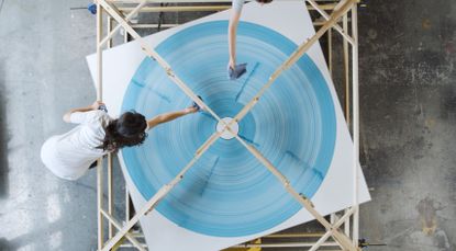 Isabel + Helen's show, 'In Orbit' at Saatchi Gallery comprises a new series of hypnotic, large-scale paintings created by hand-assembled, low-tech contraptions