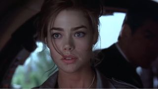 Denise Richards looks ahead as she takes the controls in The World is Not Enough.
