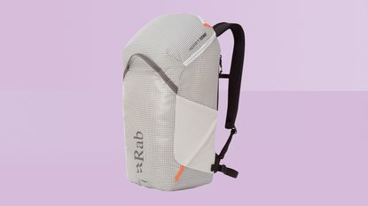 Rab Adrift backpack against purple background