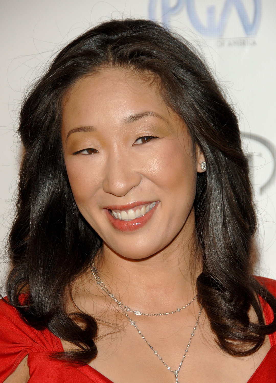 Sandra Oh arrives at the 2006 Producers Guild awards held at the Universal Hilton on January 22, 2006 in Universal City, California