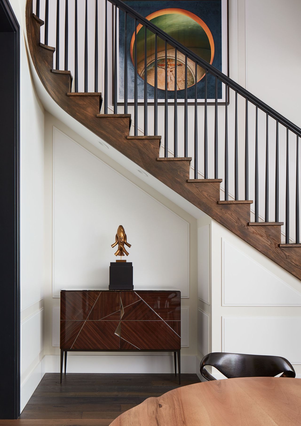 Wooden staircase and flooring, white walls