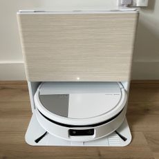 iRobot Roomba Max 705 Combo Robot Vacuum Cleaner and Mop sitting on wood-effect flooring