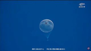 China's Shenzhou 13 space capsule carrying a crew of three lands safely in