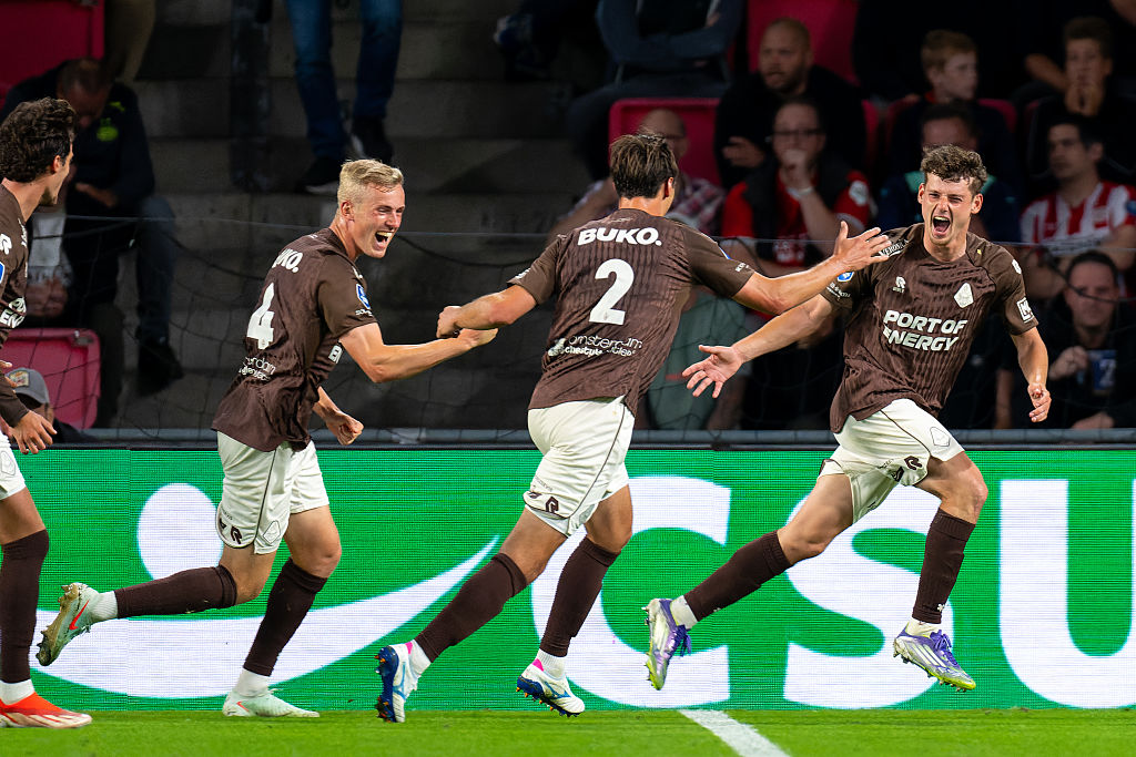 Patrick Brouwer of sc Telstar celebrates after scoring the team&#039;s second goal with Guus Offerhaus of sc Telstar and Jeff Hardeveld of sc Telstar during the Dutch Eredivisie match between PSV and Telstar at Philips Stadion on August 30, 2025 in Eindhoven, Netherlands