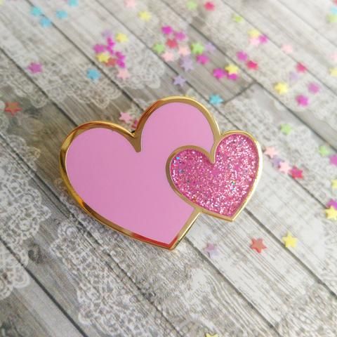 Flick through the images to see various pin designs