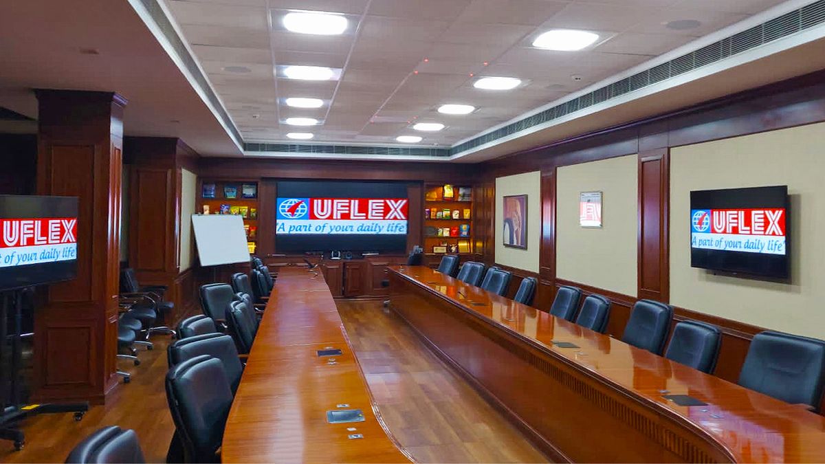 A corporate boardroom brought to life with Extron AVoIP solutions. 