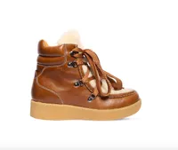 Isabel Marant Alpica shearling and leather boots, £570, £342