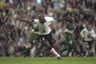 24 May 1997: Ian Wright of England celebrates after scoring a goal during the International Friendly against South Africa at Old Trafford in Manchester, England. England won the match 2-1. \ Mandatory Credit: Ben Radford /Allsport