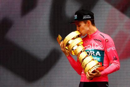 Jai Hindley with the Giro d'Italia trophy