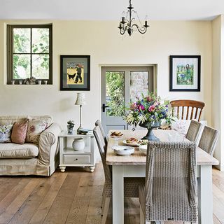 open plan dining area with frame on wall