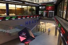 Stock price information displayed in the London Stock Exchange Group Plc's office atrium in the City of London, UK