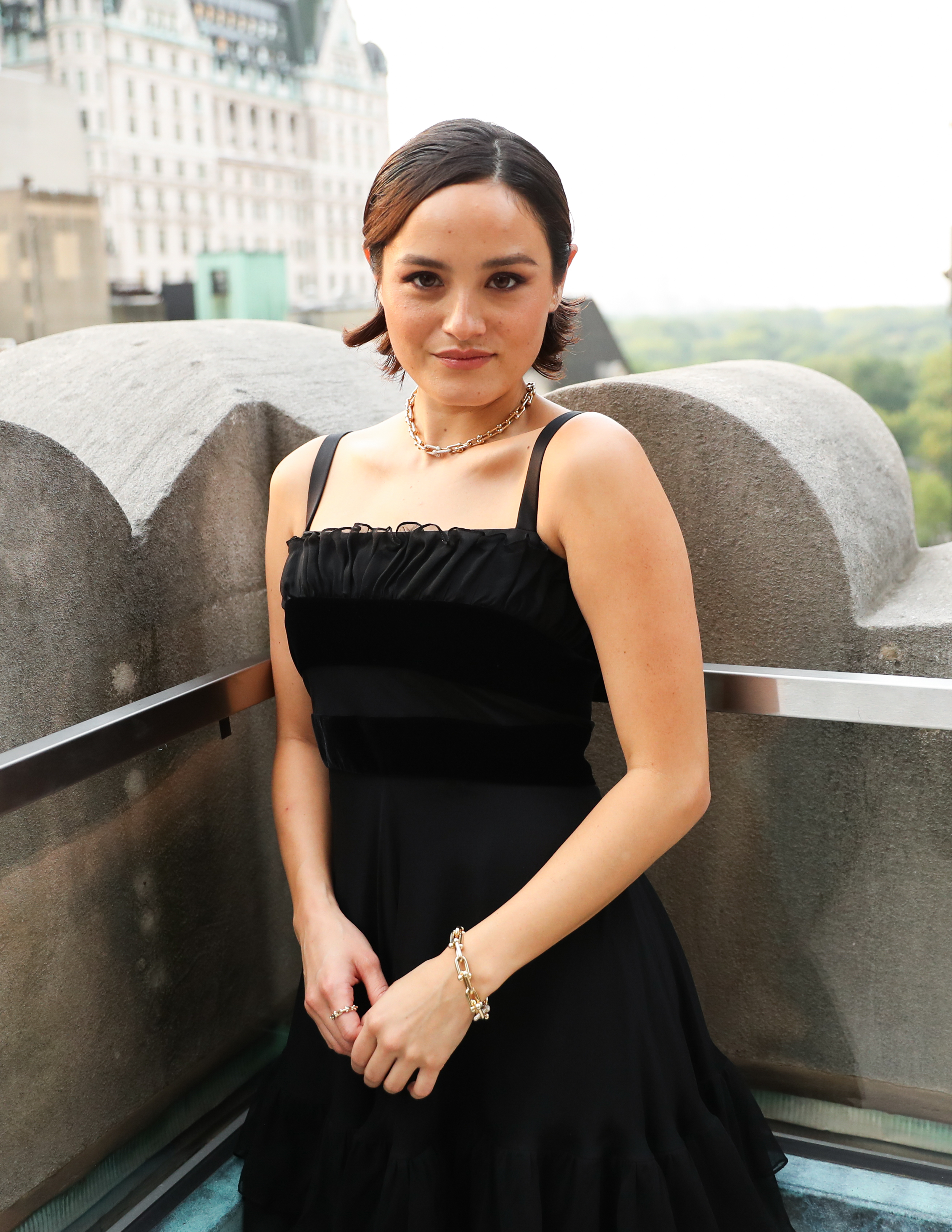Chase Sui Wonders wears a black dress