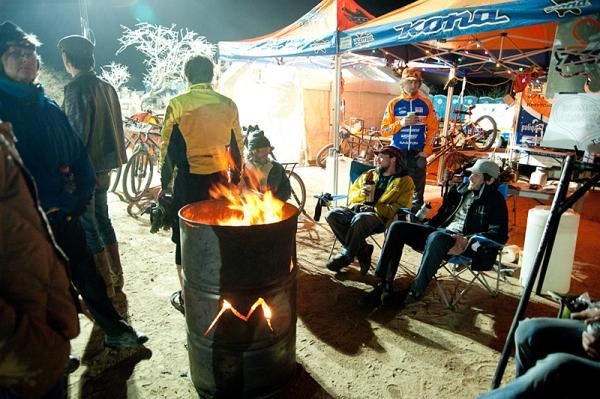 Warming up around the barrel fire and the hospitality of the Kona crew are a welcome respite at the Kona Bikes 24 Hours in the Old Pueblo race.