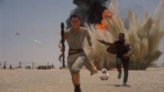Daisey Ridley and John Boyega in Star Wars: The Force Awakens