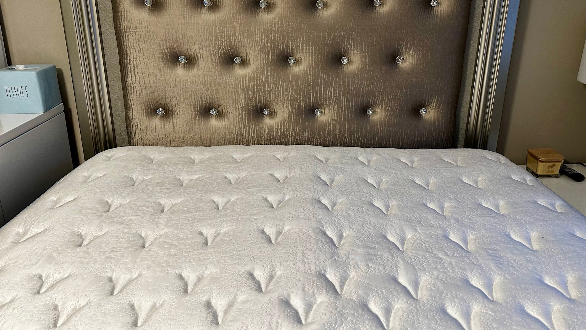 Close up of the Glacier Apex Hybrid mattress in a bedroom