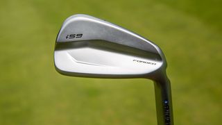 Ping i59 Iron with a grass background