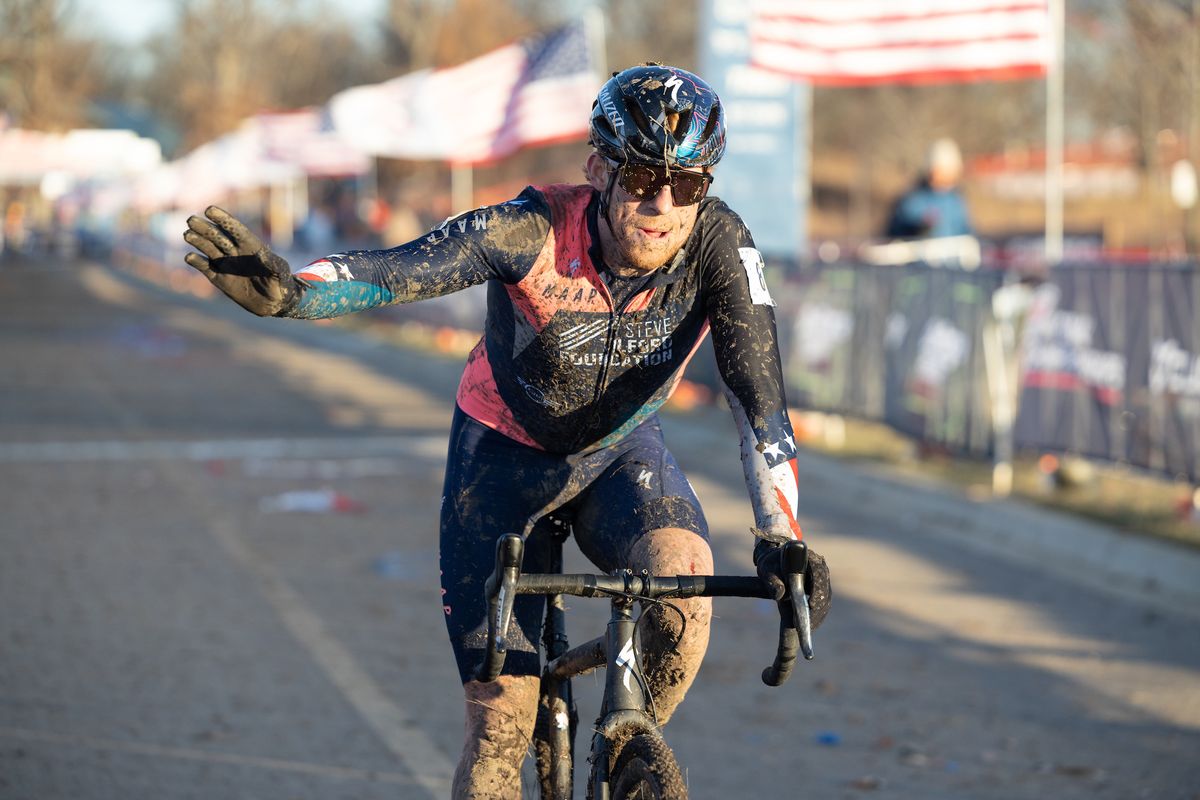 Stephen Hyde waves to the crowd after finishing ninth at 2021 USA Cycling Cyclocross National Championships