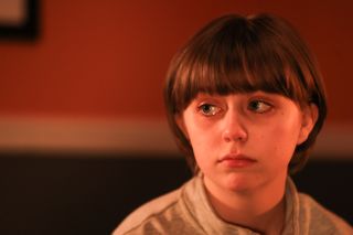 Ro Hutchinson played by Ava Webster