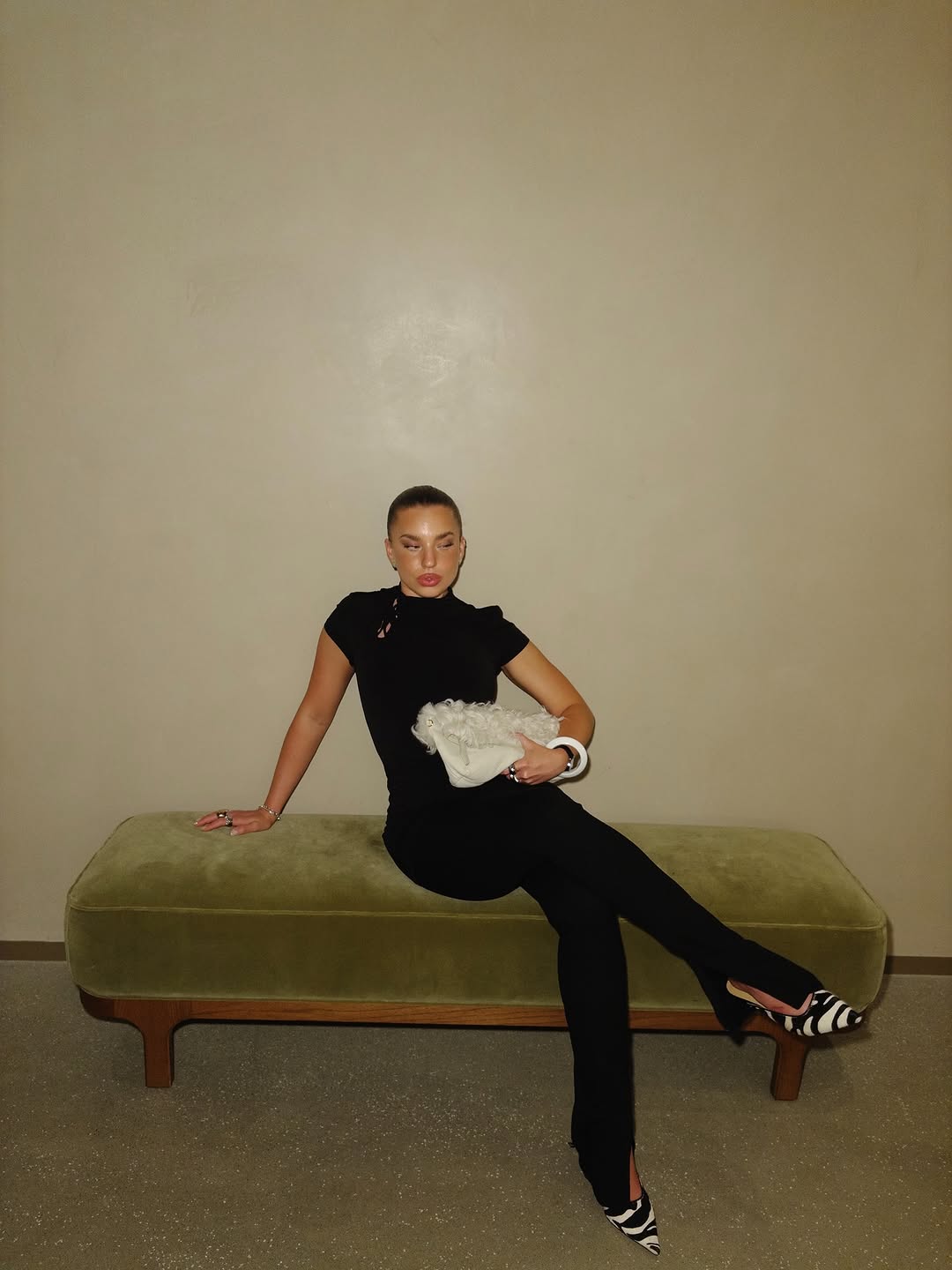 woman wearing flattering black pants with slight flare