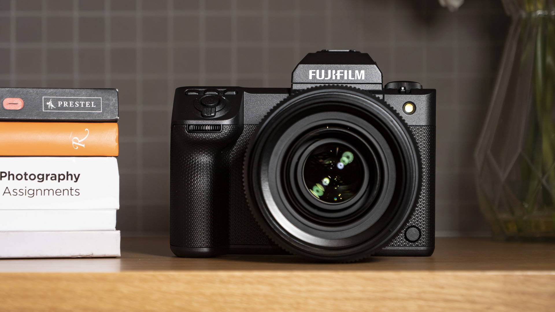 Fujifilm GFX100 II on a wooden table