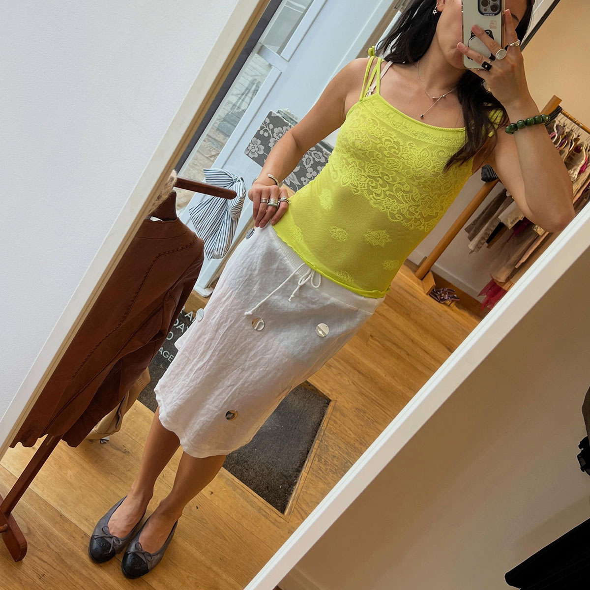 Woman wearing a skirt and ballet flats