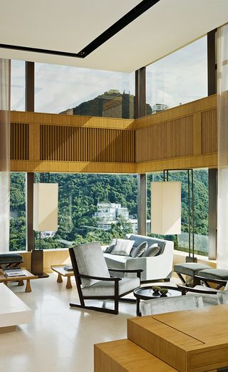 Living room with wooden easy chairs