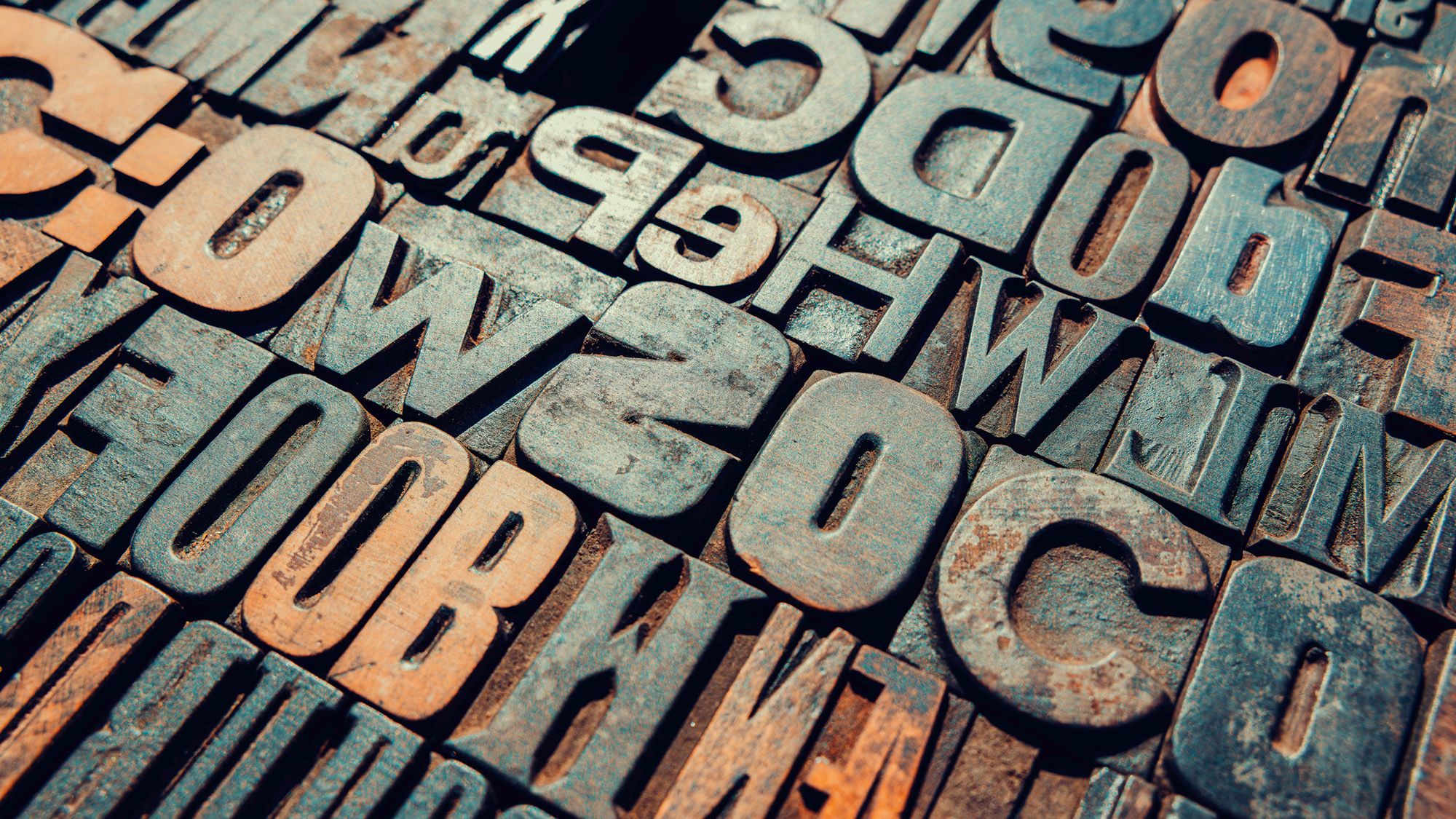 A series of letter printing blocks.