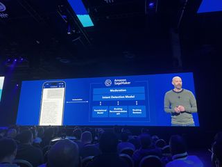 Rob Francis, CTO and SVP of Booking.com speaking on stage at AWS re:Invent 2023