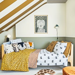 White and sage green bedroom with stripes on ceiling