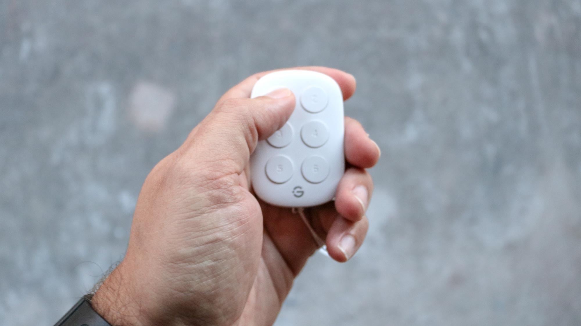 The Govee Smart Button Sensor in hand