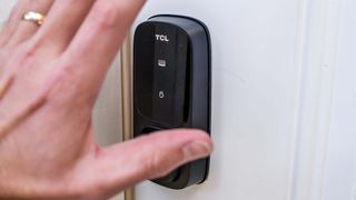 TCL D1 Pro lock attached to front door