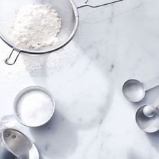 Ingredient, Flour, Powder, Chemical compound, Metal, Circle, Kitchen utensil, Silver, All-purpose flour, Bread flour, 