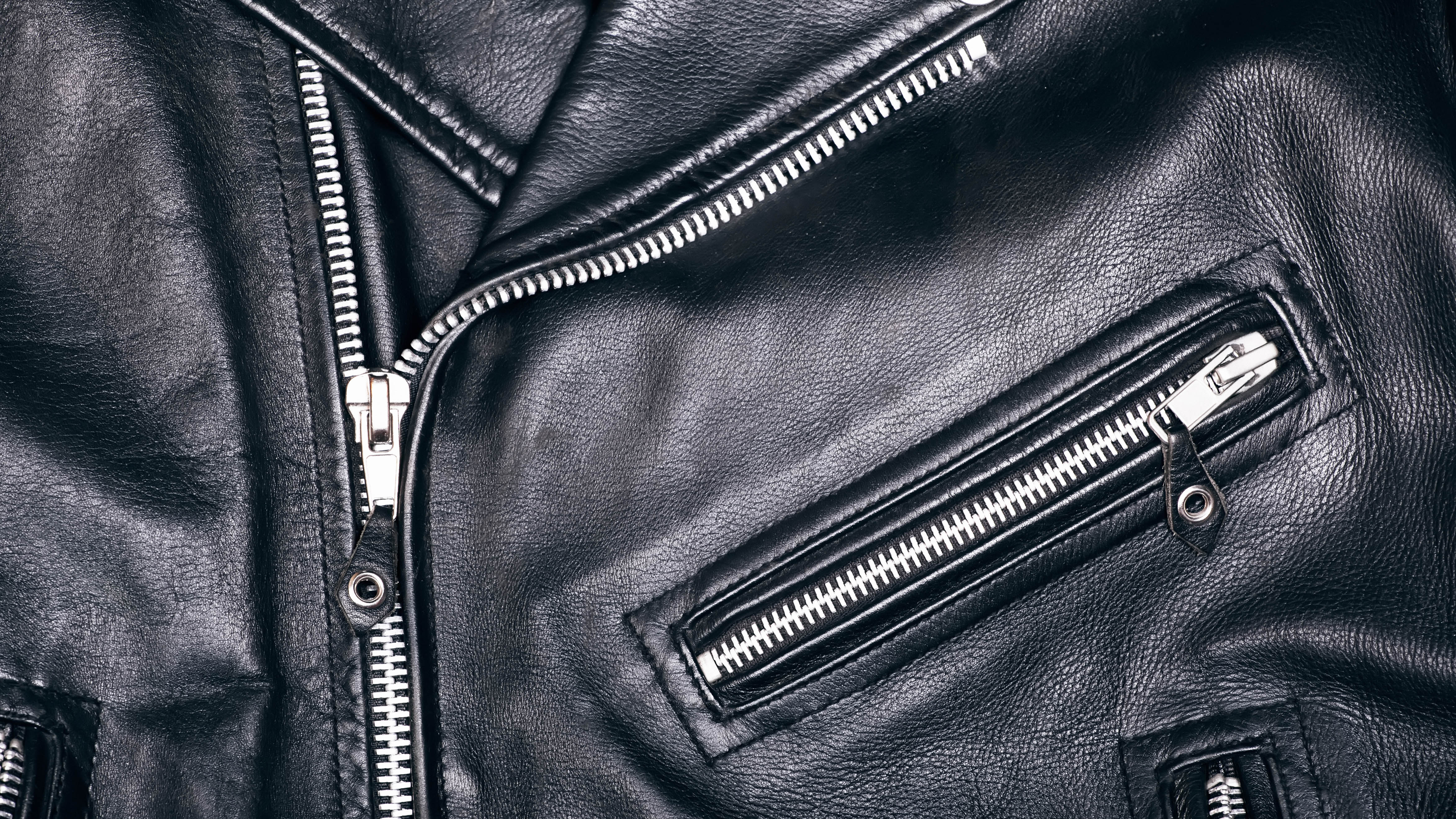 close up of black leather jacket with zip
