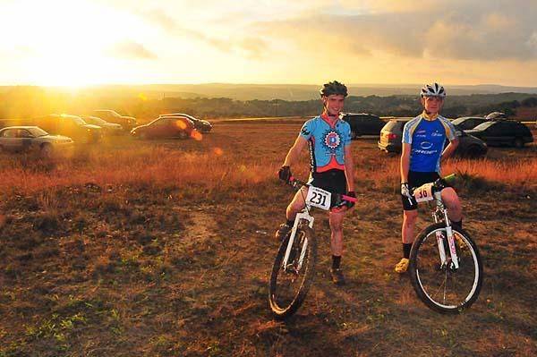 Brothers Ian (left, finished second in singlespeed) and Eric Fleming (finished 23rd in pro men's race) enjoy the sunset after a slippery preride. "Fast" runs in the family.